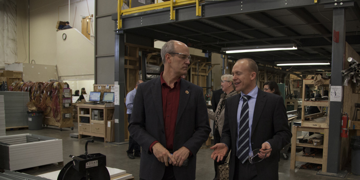 Congressman Larsen with Jim Mischel at the beginning of the tour of Electric Mirror's production facilities.